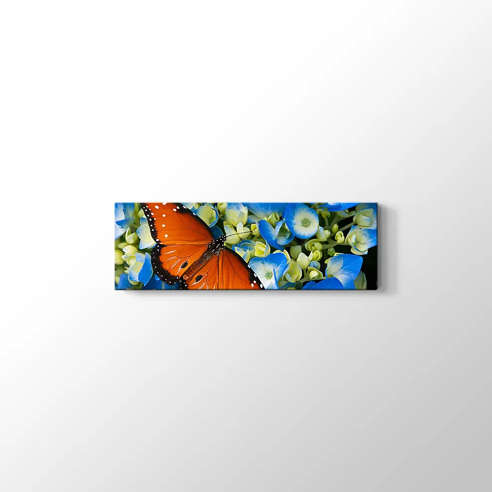 Mavi Çiçekte Kelebek Kanvas Tablo