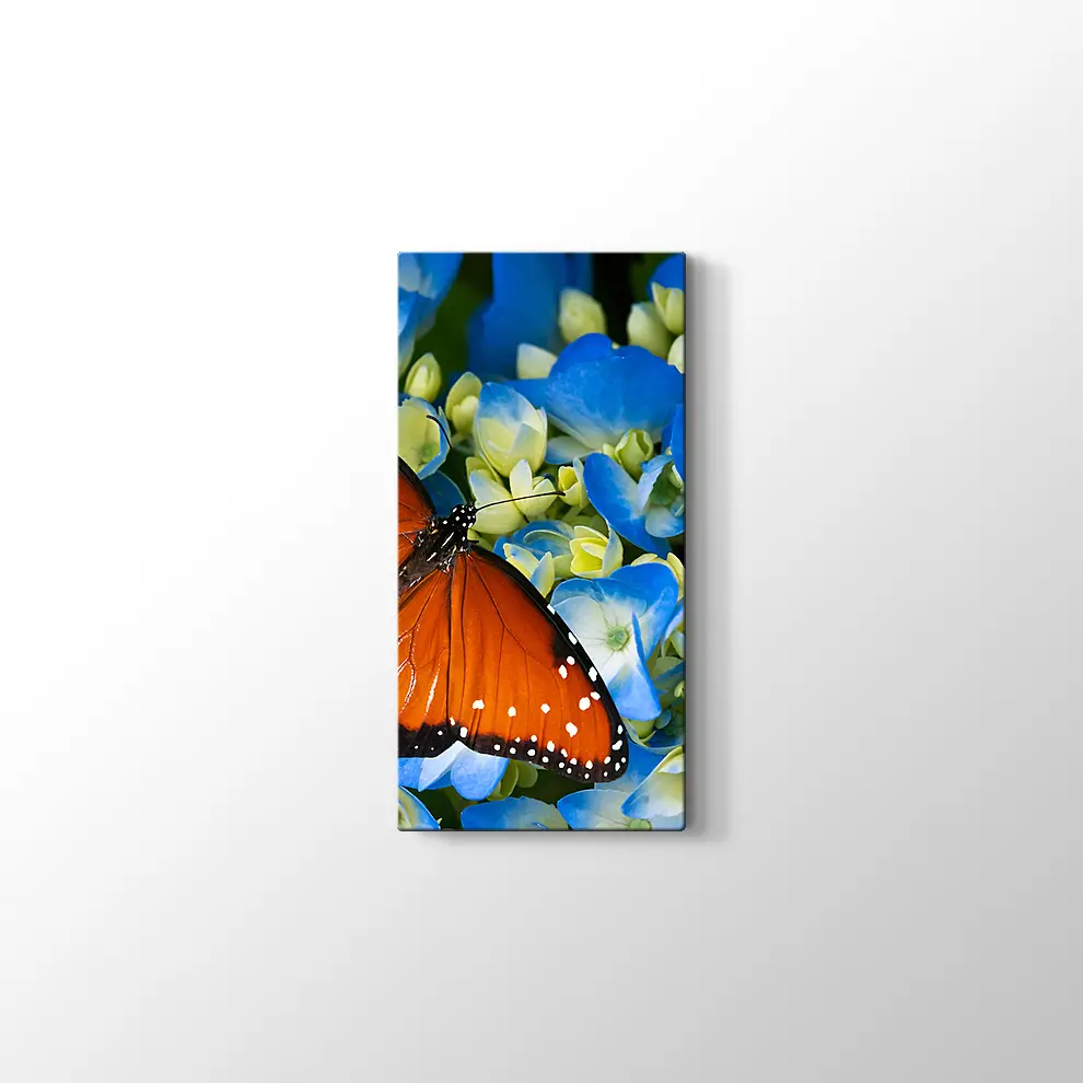 Mavi Çiçekte Kelebek Kanvas Tablo