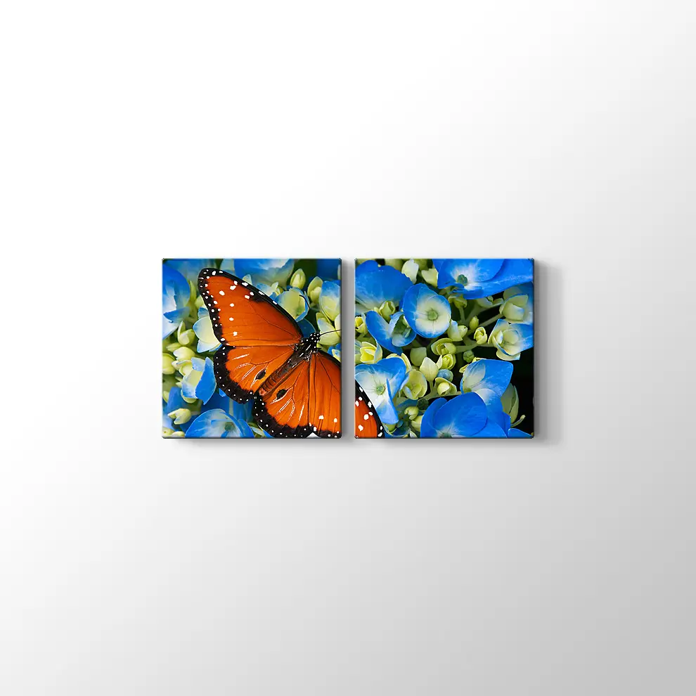 Mavi Çiçekte Kelebek Kanvas Tablo