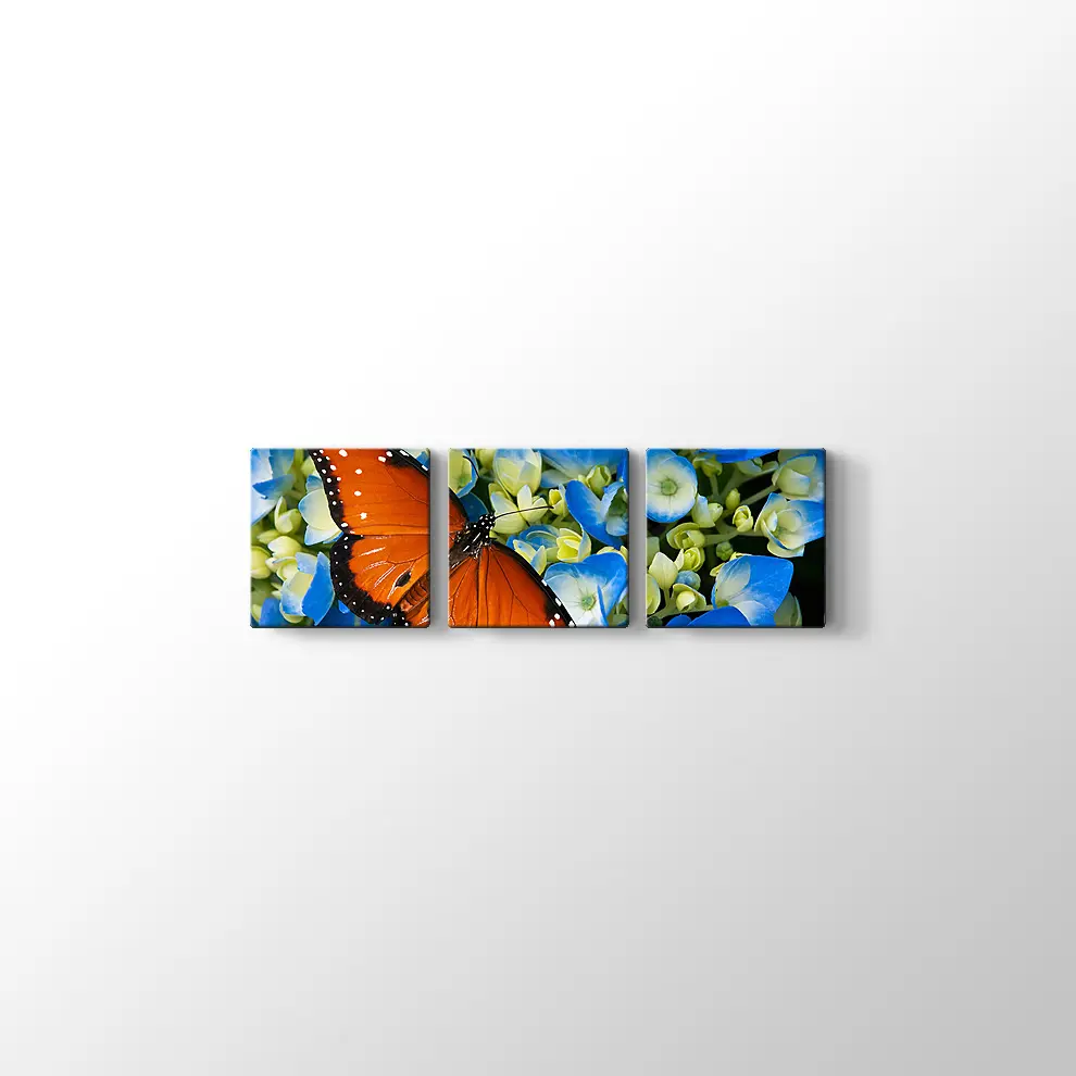 Mavi Çiçekte Kelebek Kanvas Tablo