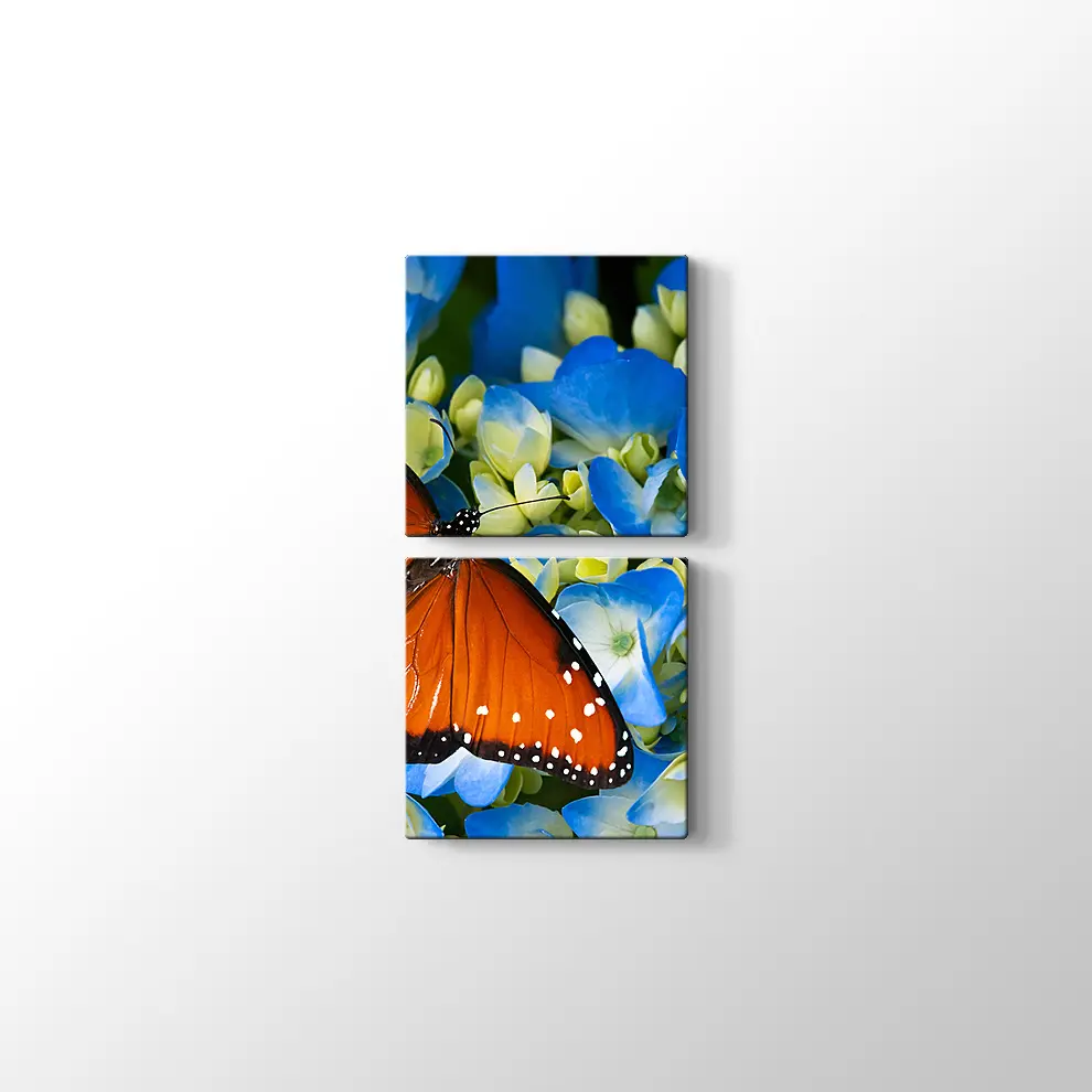 Mavi Çiçekte Kelebek Kanvas Tablo