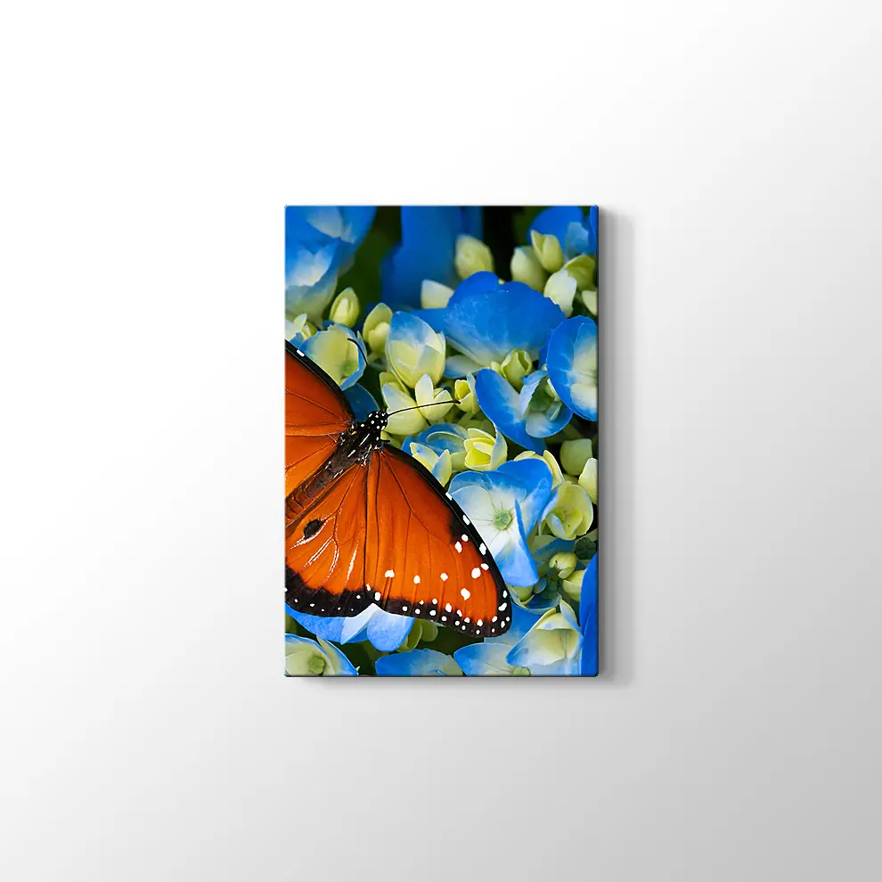 Mavi Çiçekte Kelebek Kanvas Tablo